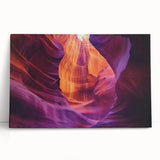 Vibrant stretched canvas artwork depicting a breathtaking landscape of canyons at sunset, showcasing rich colors and intricate details that enhance home decor. This eye-catching piece adds a natural touch to any living space.