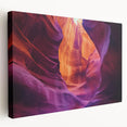 Stretched canvas artwork depicting a vibrant landscape of canyons with rich earthy tones, showcasing layered rock formations and dramatic skies. Perfect for nature lovers.