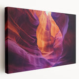 Stretched canvas artwork depicting a vibrant landscape of canyons with rich earthy tones, showcasing layered rock formations and dramatic skies. Perfect for nature lovers.