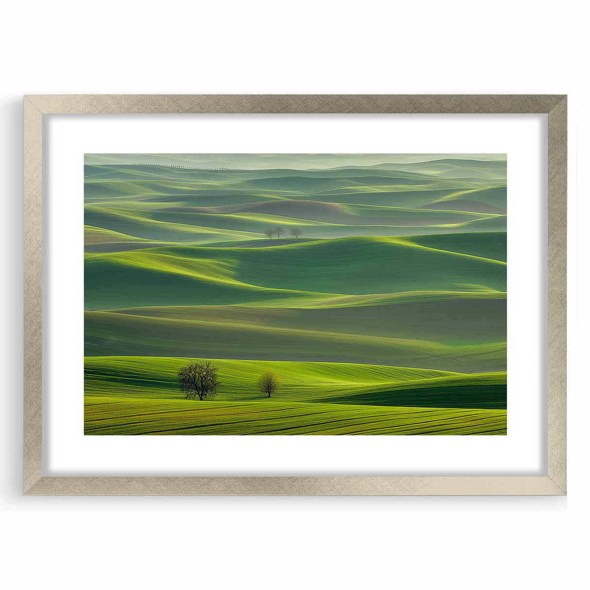 Silver-framed landscape art print showcasing a serene countryside scene, featuring vibrant colors and a white mat, ideal for home decor or gallery display.