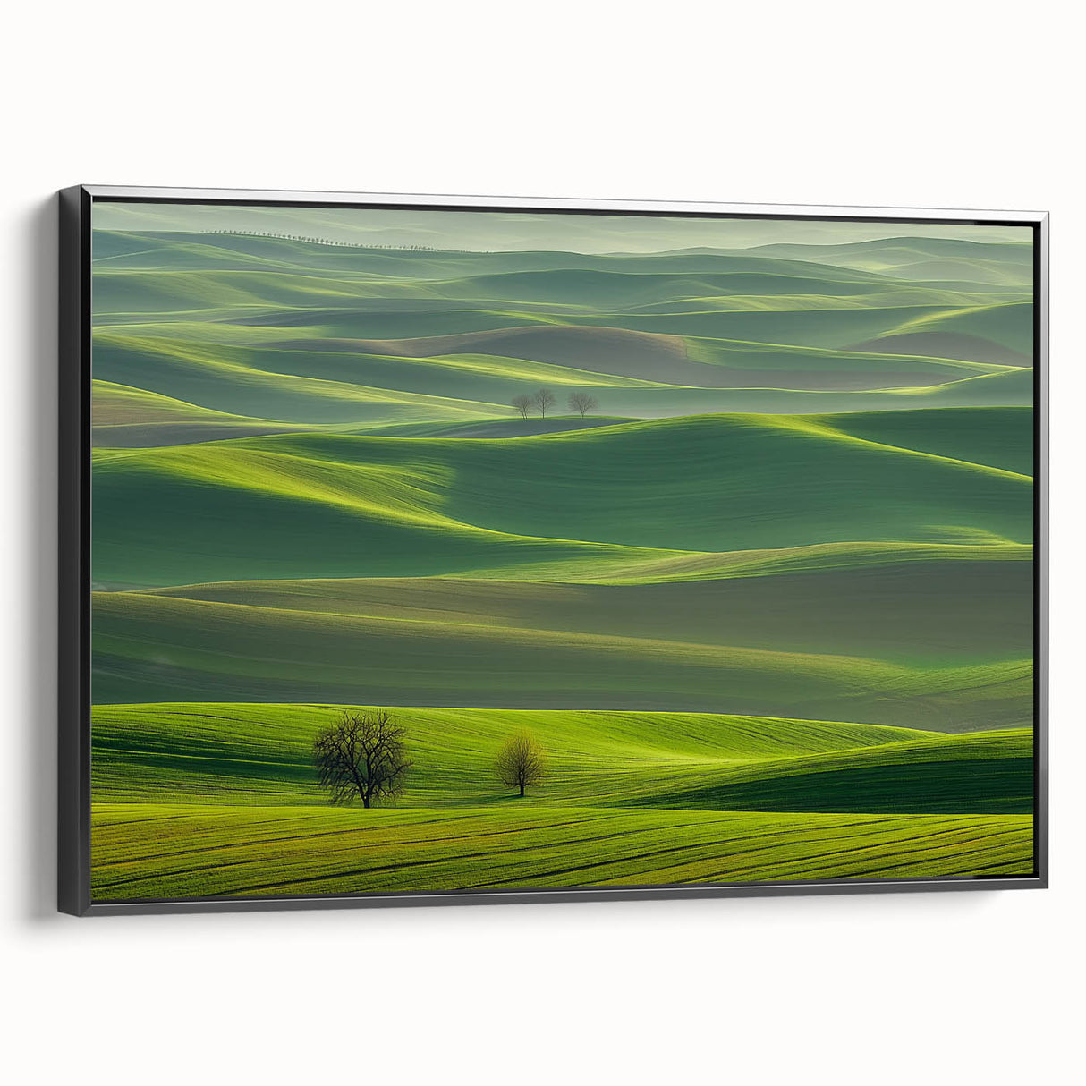 Framed canvas print showcasing a serene countryside landscape with rolling hills and a vibrant sky, featuring a sleek black frame for modern decor enhancement.