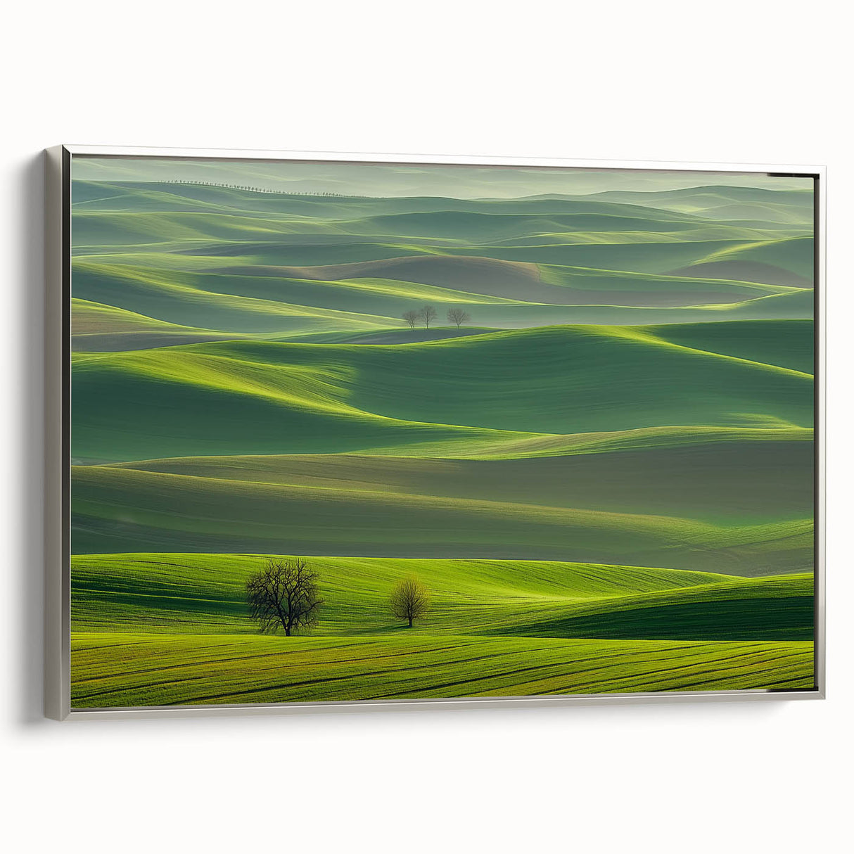 Framed canvas artwork showcasing a serene countryside landscape with vibrant colors and intricate details, featuring a sleek silver frame that enhances its elegance and visual appeal. Perfect for home decor to bring a touch of nature indoors.