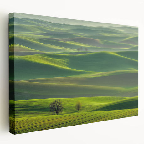 Stretched canvas artwork depicting a vibrant countryside landscape with rolling hills and a clear blue sky, showcasing rich greens and earthy tones. Perfect for home decor.