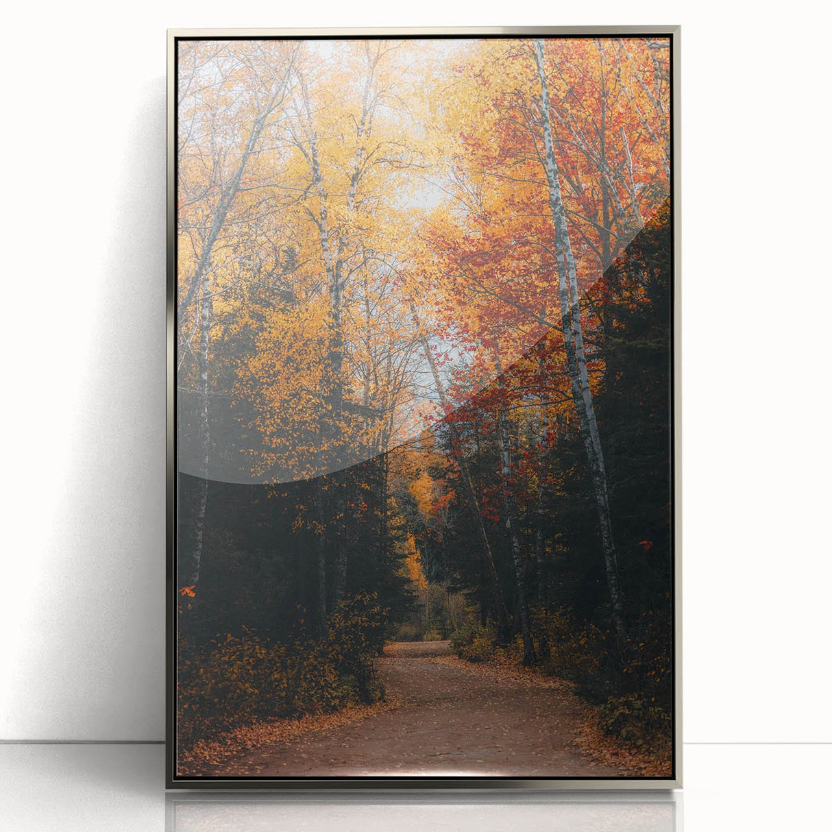 Mid-century modernist art depicting fall season in muted orange and brown tones, acrylic print in a silver frame.