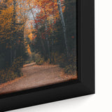 Close-up of extra large black wall art featuring a textured, colorful abstract design on a framed canvas.