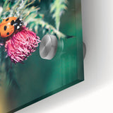 Large abstract wall art in vibrant green and yellow tones on acrylic glass.
