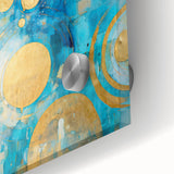 Abstract wall art print featuring vibrant strokes of blue, yellow, and pink on clear acrylic glass, showcasing a modern design ideal for contemporary decor.
