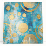 Abstract strokes wall art design on stretched canvas featuring vibrant colors of blue, orange, and yellow, leaning against a neutral wall, adding a modern aesthetic.