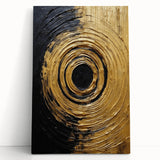 Abstract wall art featuring vibrant strokes in shades of blue, orange, and yellow on a stretched canvas, leaning against a wall for display. Perfect for modern home decor.