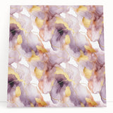 Abstract wall art showcasing vibrant, multicolored strokes on stretched canvas, leaning against a neutral wall, perfect for modern home decor.