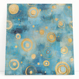 Abstract strokes wall art on stretched canvas, featuring vibrant colors in a modern design, leaning against a neutral wall, ideal for contemporary decor.