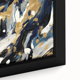 Close-up of a framed canvas wall art piece showcasing vibrant abstract strokes in shades of blue, orange, and yellow, adding modern flair to home decor.