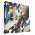 Abstract strokes wall art on stretched canvas showcases vibrant colors of blue, yellow, and pink. The side view highlights the canvas’s depth and texture, perfect for modern home decor.