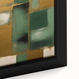 Close-up of a framed canvas showcasing vibrant abstract strokes in shades of blue, orange, and gold, perfect for adding a modern touch to any decor.
