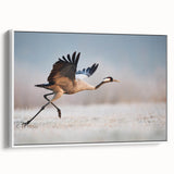 Framed canvas wall art showcasing a contemporary abstract design in vibrant colors, displayed in a stylish white frame, enhancing modern decor aesthetics.