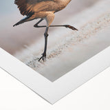 Rolled canvas showcasing an abstract African wall art design, highlighting vibrant colors and intricate patterns, packaged securely in a protective cardboard tube. Ideal for home decor enthusiasts seeking unique, cultural artwork.