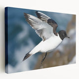 Stretched canvas wall art showcasing an abstract design with vibrant colors, displayed in a side view to highlight its depth and texture, perfect for modern decor.