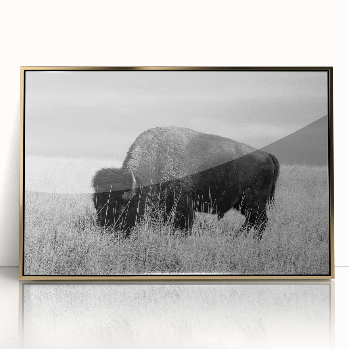 Framed acrylic wall art featuring a modern gold design, showcased in a sleek frame against a white background, perfect for contemporary home decor.