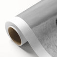 Rolled canvas showcasing a vibrant African wall art design with intricate patterns and rich colors, elegantly packaged in a durable cardboard tube for safe delivery.