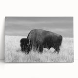 Stretched canvas wall art collection featuring vibrant abstract designs in bold colors, elegantly leaning against a white wall, enhancing modern home decor.