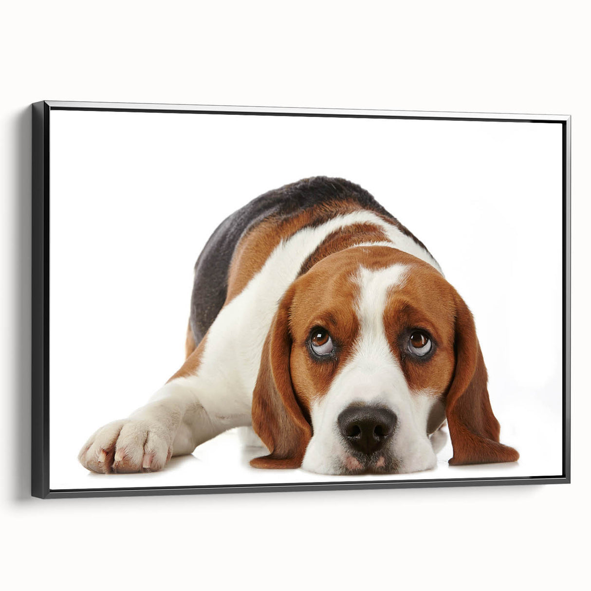Framed canvas wall art showcasing a vibrant beagle design in a black frame, perfect for dog lovers, displayed from a side view against a neutral background.
