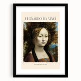 Colorful abstract art print of geometric shapes in vibrant hues on a large black-framed canvas, ideal for living room decor.