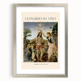 Abstract art print of geometric shapes in muted blue and grey tones on a silver-framed canvas.