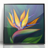 Framed wall art featuring a vibrant Bird of Paradise design with colorful floral elements, set in a sleek black frame, ideal for modern home decor accents.