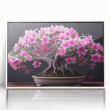 Framed wall art showcasing a botanical bonsai tree design, featuring delicate floral patterns and a crisp white frame, ideal for home decor or office spaces.