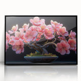 Framed wall art showcasing a botanical bonsai tree design with vibrant flowers, set against a sleek black background, perfect for modern decor.