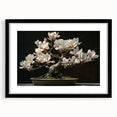 Botanical bonsai tree wall art framed in black with a white mat, showcasing intricate floral designs and vibrant colors, perfect for home decor enhancement.