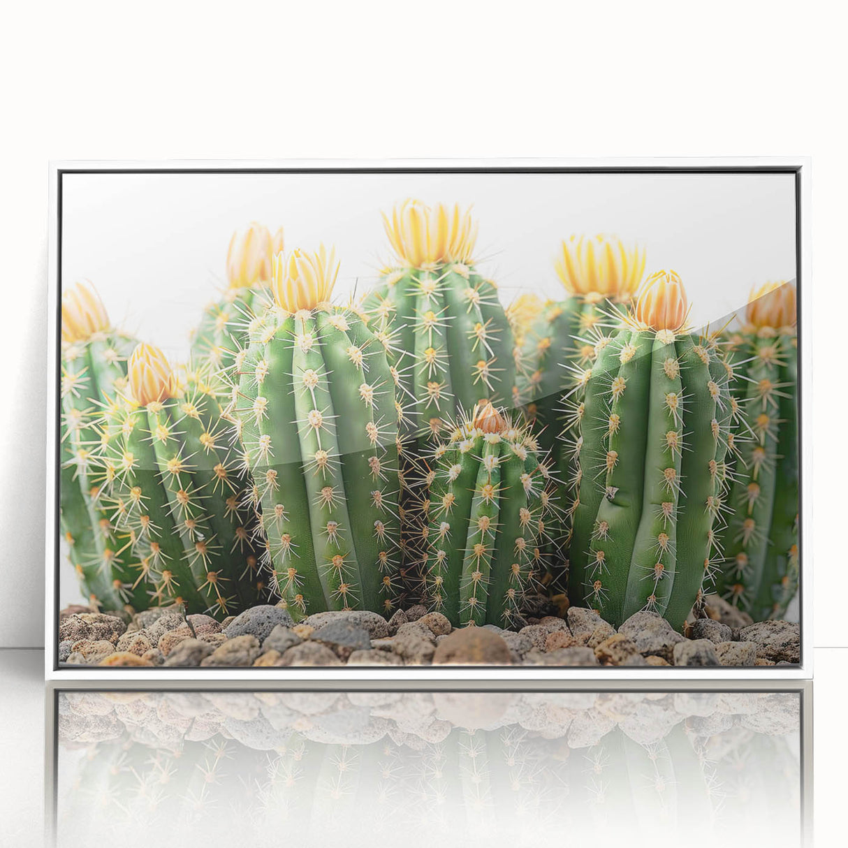 Framed wall art featuring a vibrant botanical cactus design in shades of green and pink, set against a white background, ideal for home decor enthusiasts. This piece adds a touch of nature-inspired elegance to any space.