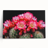Botanical wall art featuring a vibrant cactus design on stretched canvas, leaning against a neutral background, perfect for modern home decor.