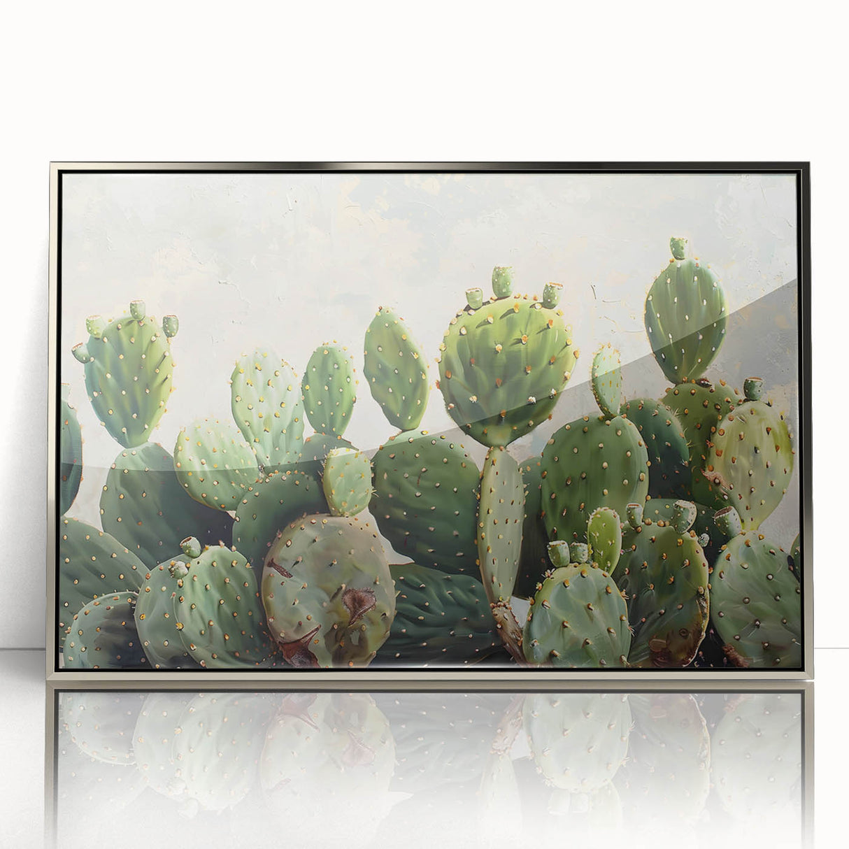 Framed wall art featuring a botanical cactus design with vibrant green hues, set in a sleek silver frame, perfect for modern home decor or office spaces.