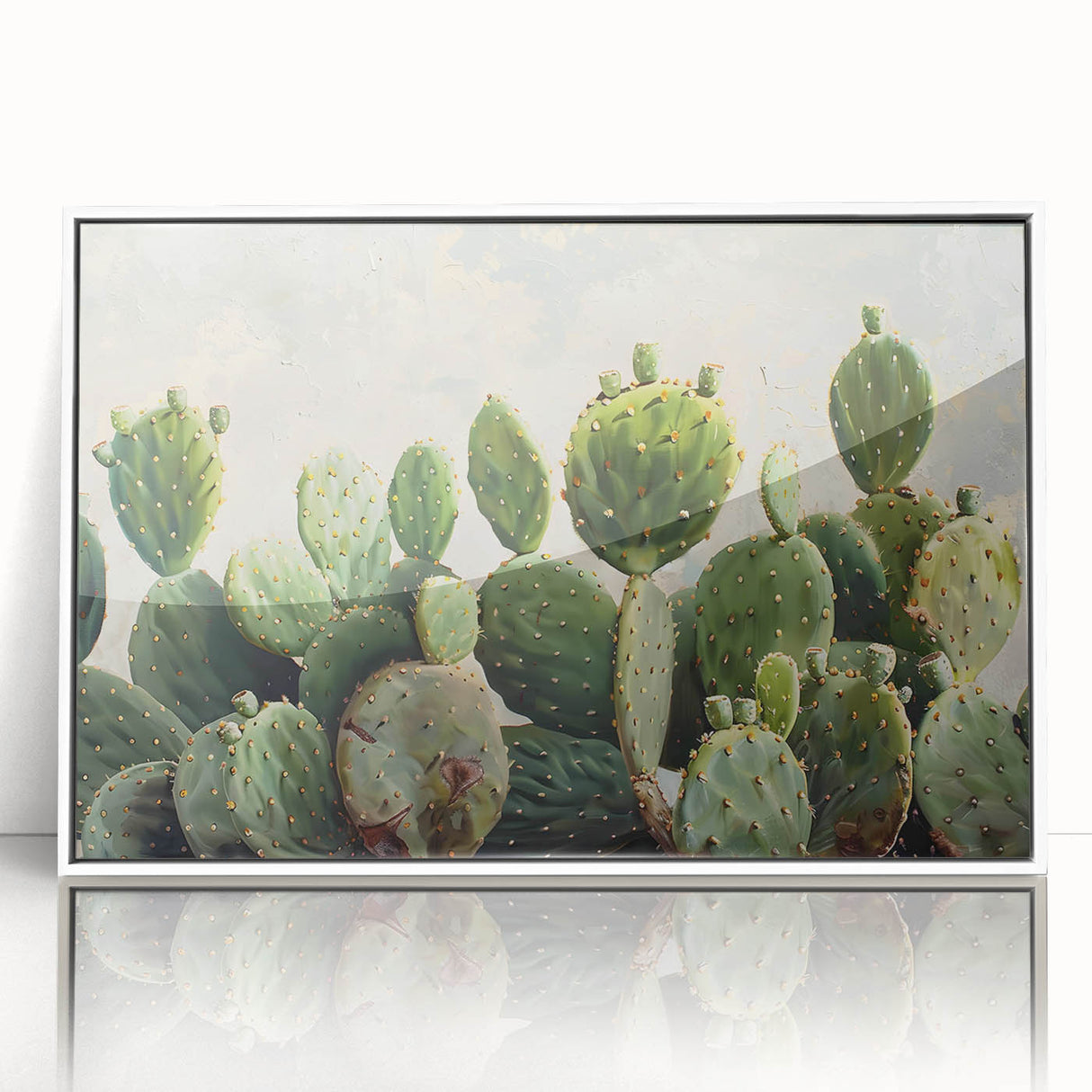 Framed wall art showcasing a botanical cactus design with vibrant colors, set against a sleek white background, perfect for modern home décor.