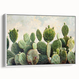 Framed canvas wall art featuring a botanical cactus design in vibrant greens and browns, showcasing intricate details against a white background, perfect for modern decor.