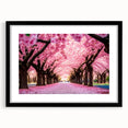 Elegant black-framed botanical wall art showcasing a delicate cherry blossom design, featuring a white mat for a refined look, perfect for home decor.