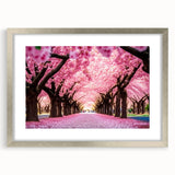 Botanical wall art featuring a delicate cherry blossom design in a silver frame with a mat, showcasing intricate floral details and elegant aesthetics, perfect for home decor.