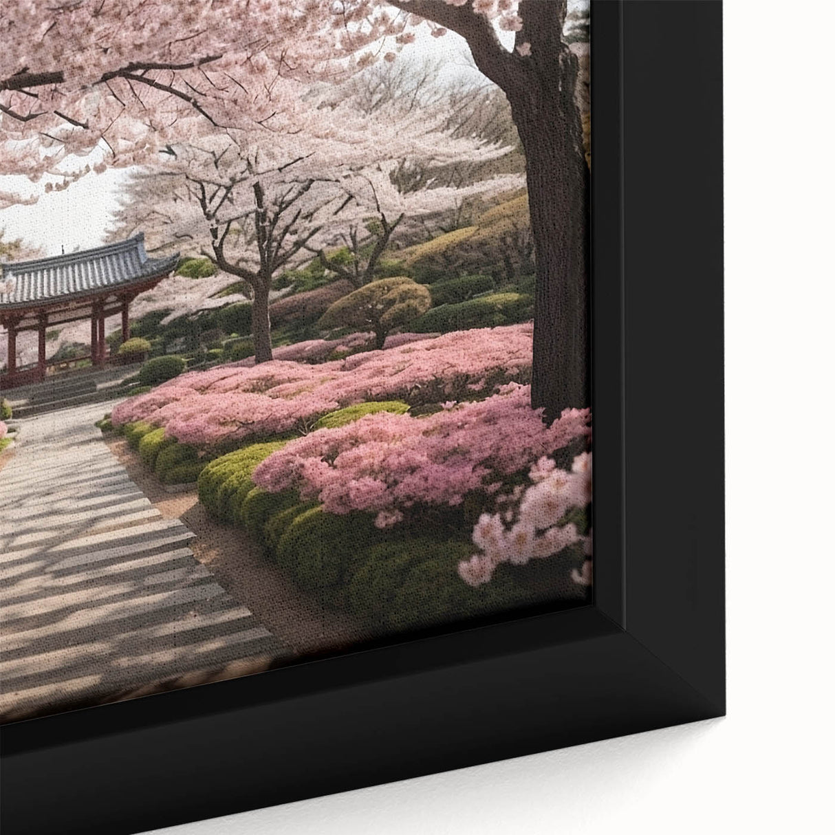 Close-up of a framed botanical wall art piece showcasing delicate cherry blossom flowers in soft pink hues, ideal for enhancing home decor with a touch of nature.