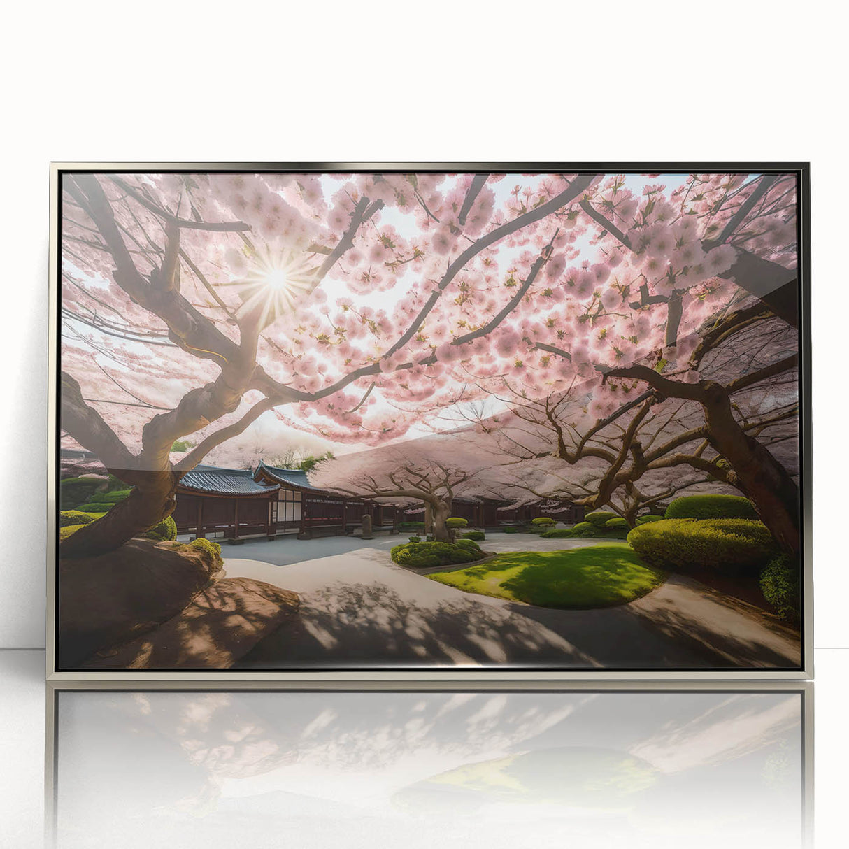 Framed botanical wall art featuring delicate cherry blossom design with silver accents, perfect for home decor, showcasing vibrant pink and white flowers against a clean background.