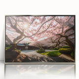 Framed botanical wall art featuring delicate cherry blossom design with silver accents, perfect for home decor, showcasing vibrant pink and white flowers against a clean background.