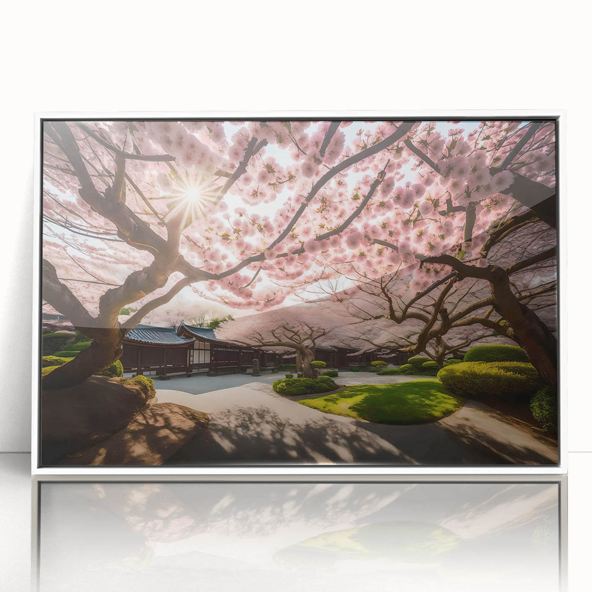 Framed wall art featuring a botanical cherry blossom design in white acrylic, showcasing delicate pink flowers against a sleek frame, perfect for home decor.