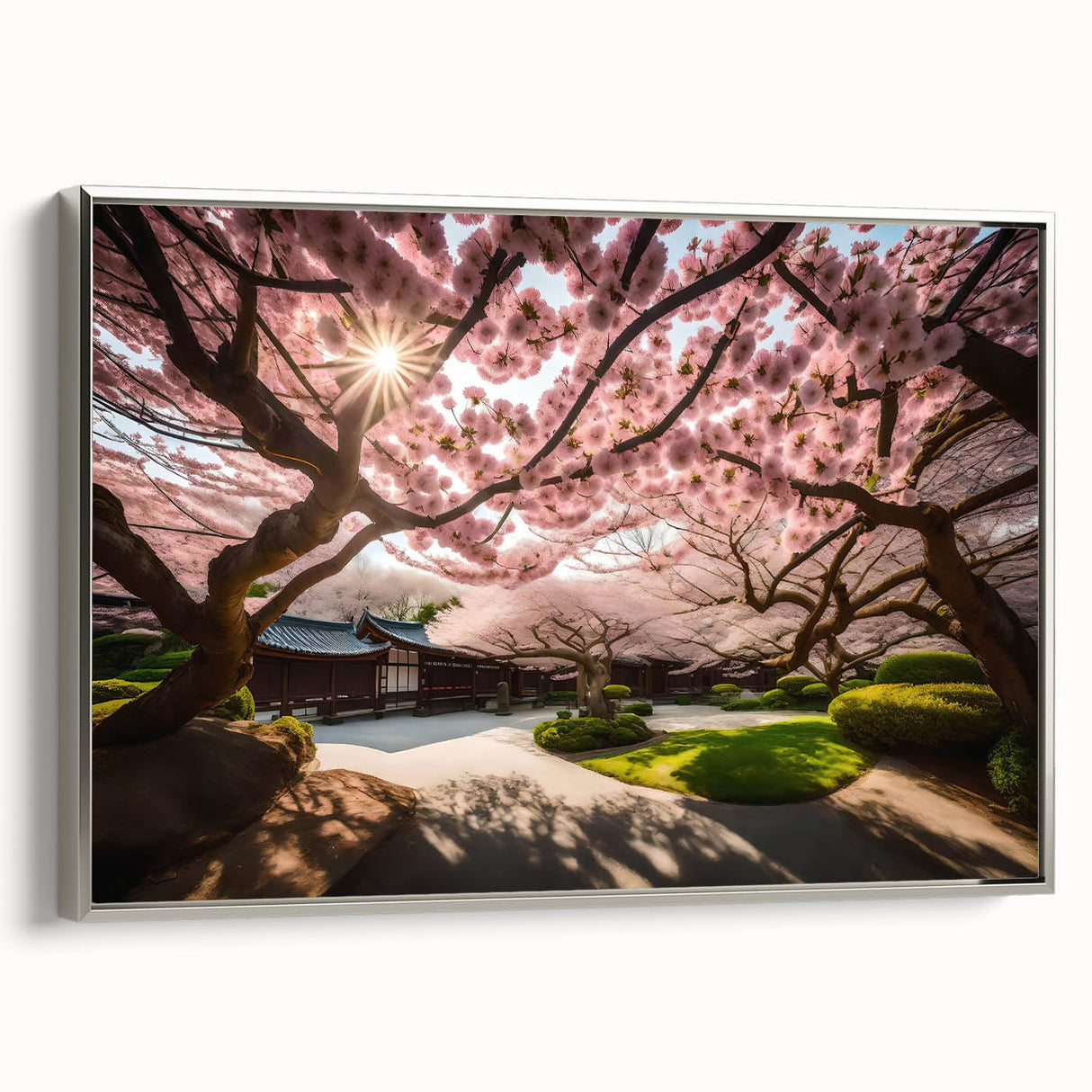 Framed wall art showcasing a botanical cherry blossom design, featuring delicate pink flowers on a silver background, enhancing home decor with elegance.