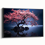Framed canvas wall art showcasing a botanical cherry blossom design, featuring soft pink flowers and delicate green leaves, set against a sleek black frame, perfect for enhancing home decor.