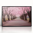 Framed acrylic wall art showcasing a beautiful botanical cherry blossom design with vibrant pink flowers and lush green leaves, presented in a sleek black frame, ideal for home decor.