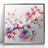 Framed wall art featuring a botanical cherry blossom design, showcasing delicate pink flowers and lush green leaves, set in a sleek silver frame for an elegant touch.