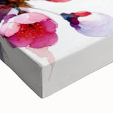 Close-up of a vibrant cherry blossom wall art design on stretched canvas, showcasing delicate pink flowers and lush green leaves, perfect for home decor.