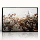 Framed botanical wall art collection showcasing vibrant floral designs on cotton fabric with a sleek black frame, ideal for modern home decor.
