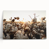 Botanical-themed stretched canvas wall art featuring vibrant flowers in soft pastel colors, elegantly leaning against a white wall, perfect for home decor.