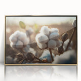 Framed botanical wall art featuring a vibrant flower design on cotton, encased in an elegant gold frame, ideal for home decor or gallery display.